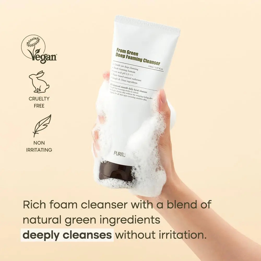 Hand holding PURITO From Green Deep Foaming Cleanser 150ml covered in rich foam, highlighting its vegan, cruelty-free, and non-irritating natural green ingredient formula that deeply cleanses.