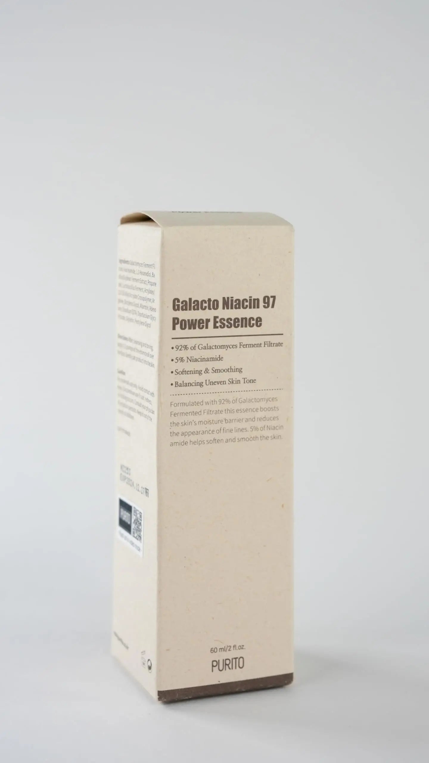 PURITO Galacto Niacin 97 Power Essence 60ml in beige packaging highlighting key ingredients like 92% Galactomyces Ferment Filtrate and 5% Niacinamide for skin softening and evening tone.