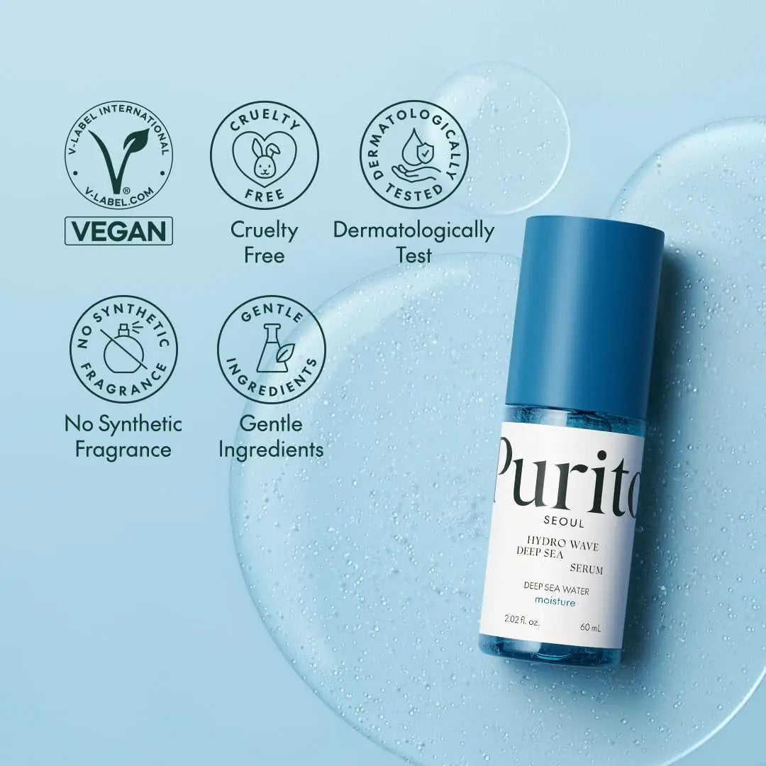 PURITO Hydro Wave Deep Sea Serum 60 ml bottle on a light blue background with water droplets and icons indicating vegan, cruelty free, dermatologically tested, no synthetic fragrance, and gentle ingredients.