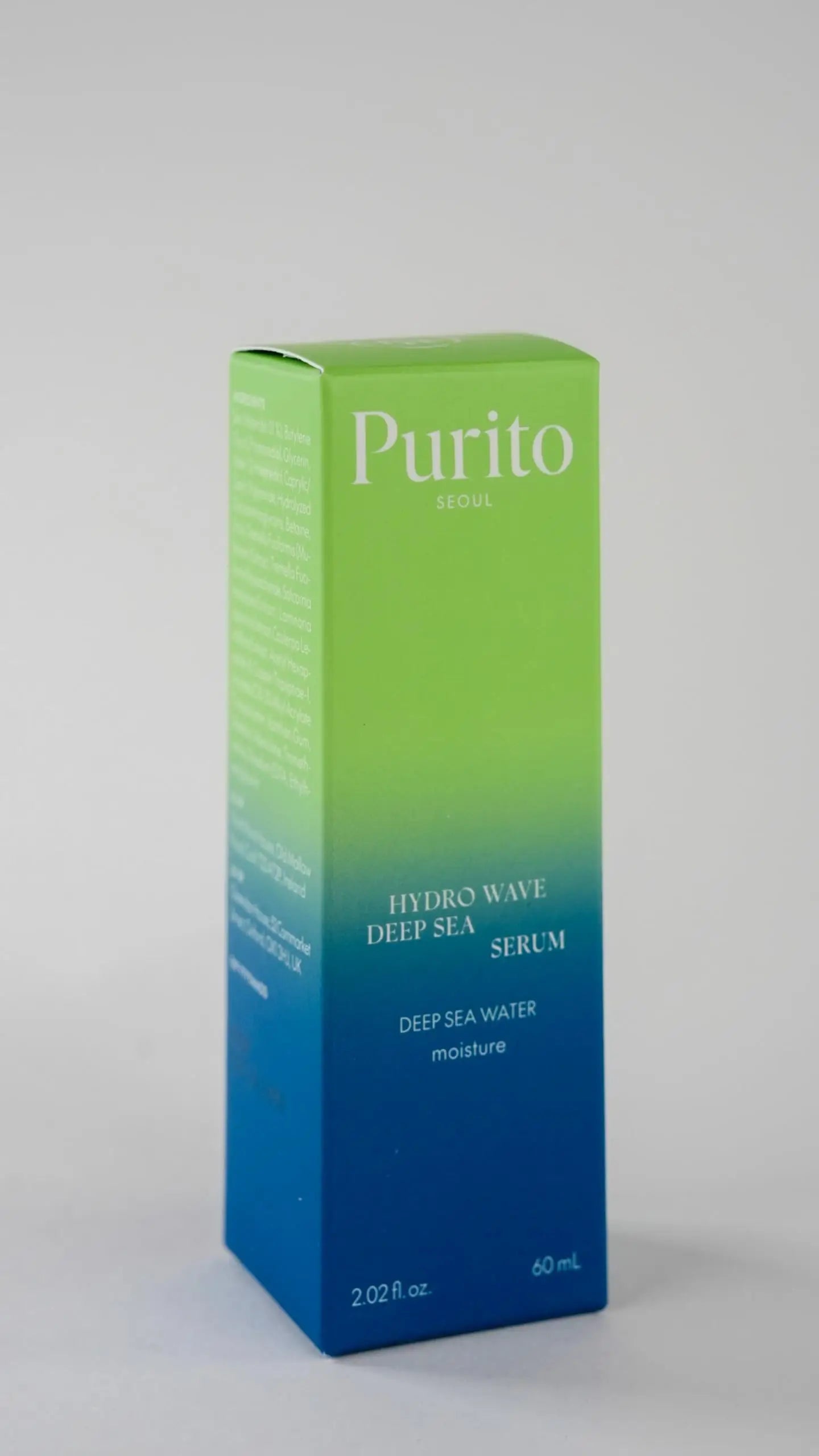 Box packaging of PURITO Hydro Wave Deep Sea Serum 60 ml in green and blue gradient colors highlighting deep sea water moisture formula.