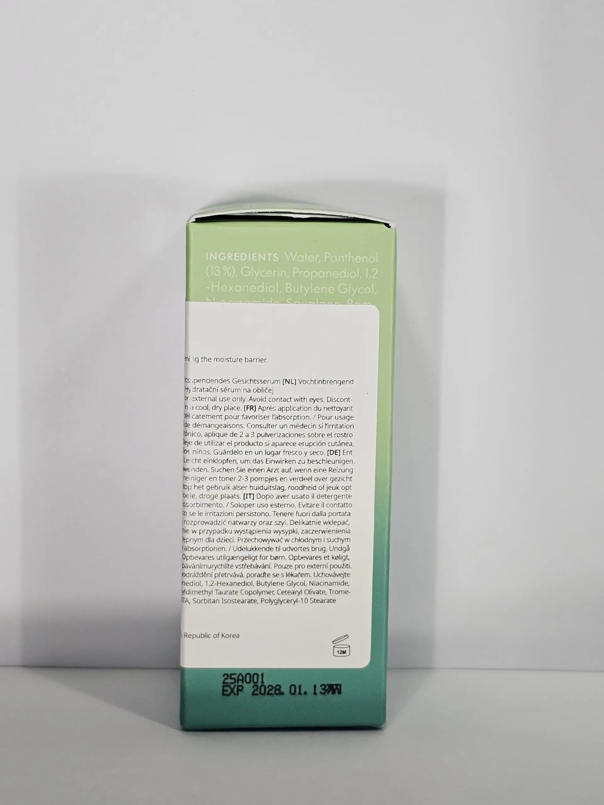 Back of PURITO Mighty Bamboo Panthenol Serum 30ml packaging showing ingredients list and multi-language usage instructions on a green gradient box.