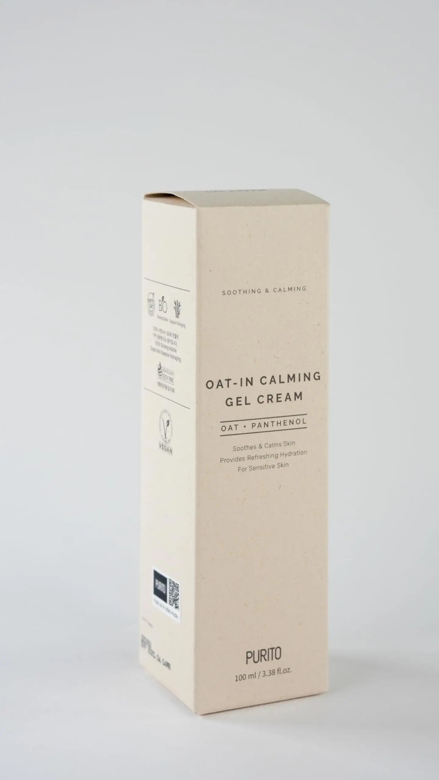 Box packaging of PURITO Oat-in Calming Gel Cream 100 ml, designed for soothing and calming sensitive skin with oat and panthenol ingredients, featuring a minimalist beige design.