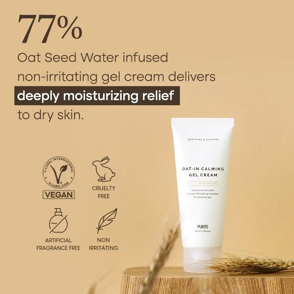 Tube of PURITO Oat-in Calming Gel Cream 100 ml displayed on a wooden surface with oat grains, highlighting its deeply moisturizing relief infused with 77% oat seed water for dry skin.
