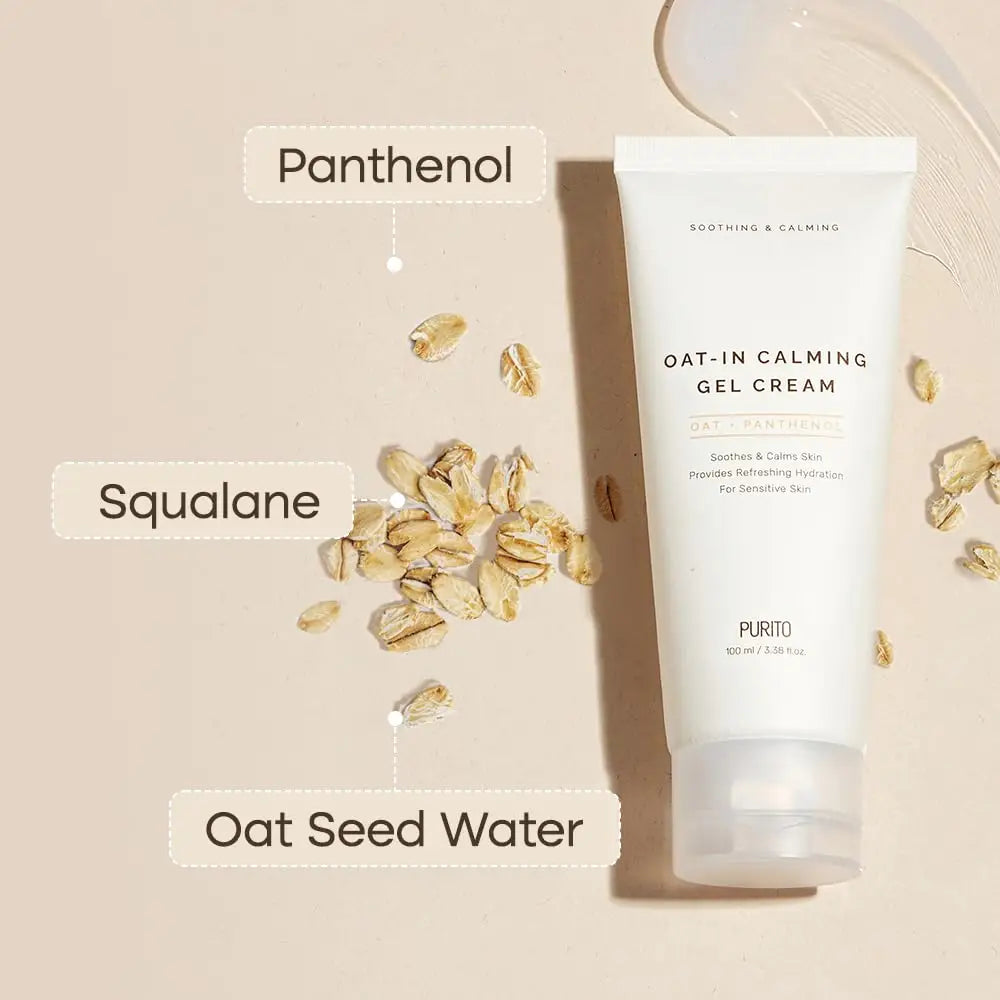 PURITO Oat-in Calming Gel Cream 100 ml tube with oat seeds and labels highlighting key ingredients Panthenol, Squalane, and Oat Seed Water on a beige background.