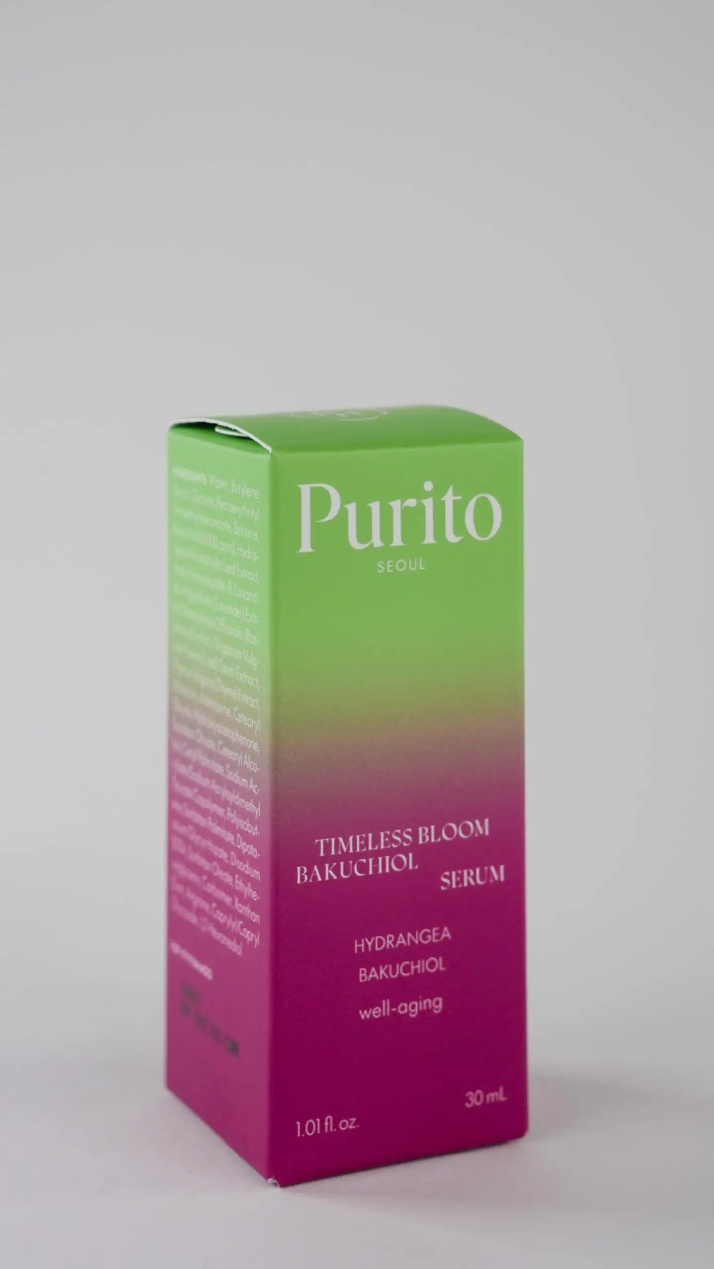 Box packaging of PURITO SEOUL Timeless Bloom Bakuchiol Serum 30ml, featuring a gradient green to pink design with product details including hydrangea and well-aging benefits.