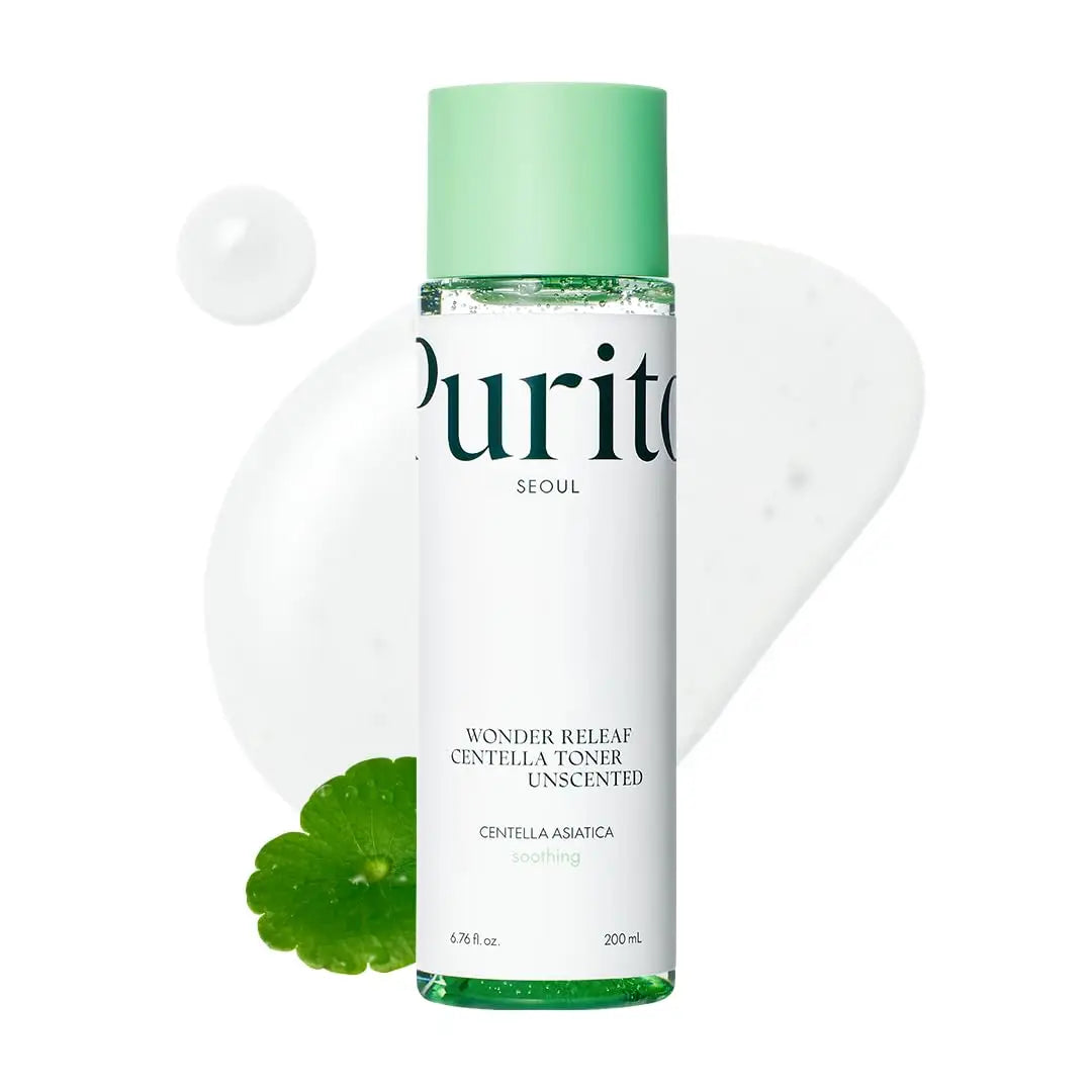 PURITO Seoul Wonder Releaf Centella Toner Unscented in a clear bottle with green cap, shown with centella leaf and transparent soothing toner drops in background.