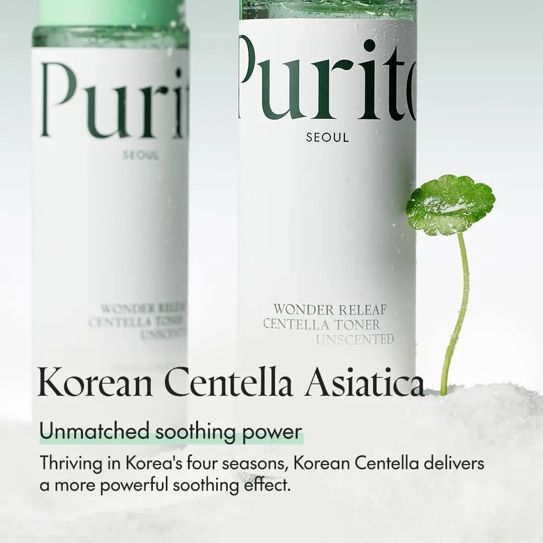 Close-up of two PURITO Seoul Wonder Releaf Centella Toner Unscented bottles with a small green centella leaf growing from white powder, highlighting soothing skincare benefits.