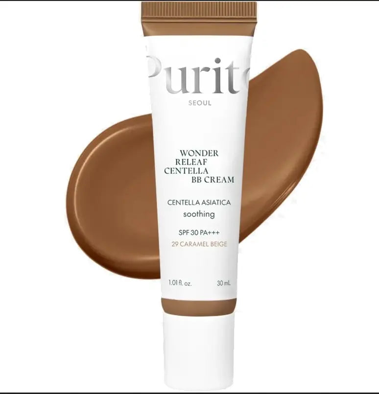 Tube of PURITO Wonder Releaf Centella BB Cream 30ml in caramel beige shade, shown with a smooth swatch of the cream behind it highlighting its rich tone and creamy texture.