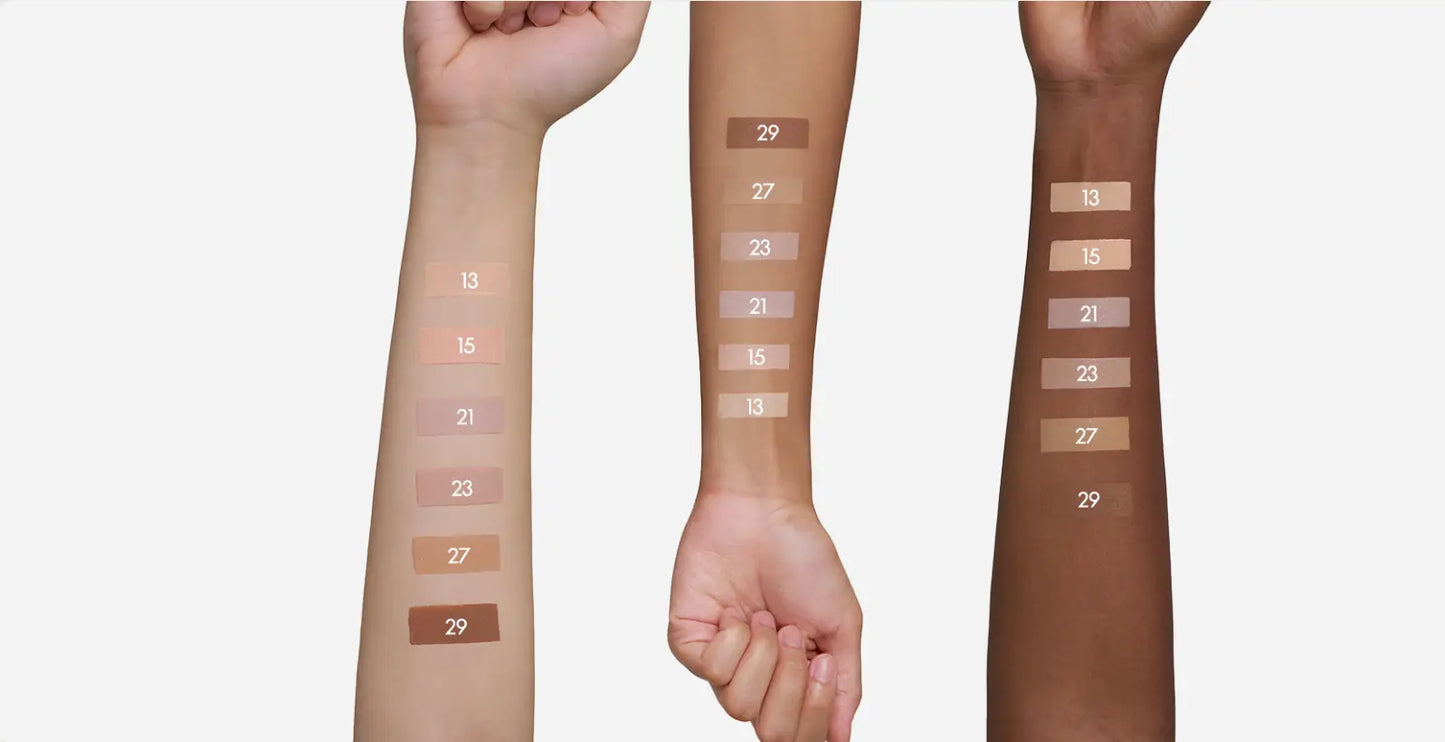 Three arms with different skin tones showing swatches of PURITO Wonder Releaf Centella BB Cream 30ml in various shades from light to dark for diverse complexion matching.