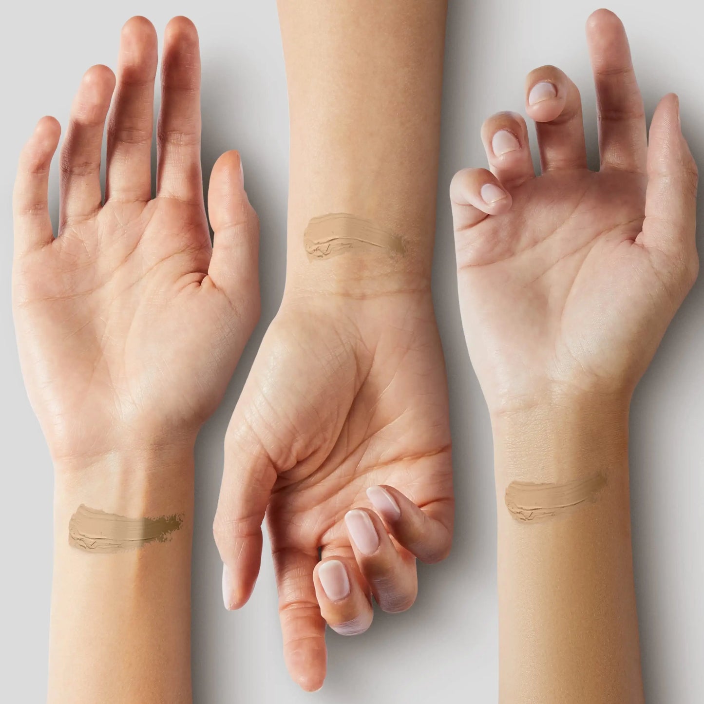 Three arms showing different skin tones with swatches of PURITO Wonder Releaf Centella BB Cream 30ml applied on the wrists against a neutral background.