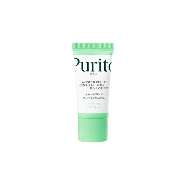 Tube of PURITO Wonder Releaf Centella Daily Sun Lotion with a green cap and white body, designed for soothing and urban defense with Centella Asiatica.