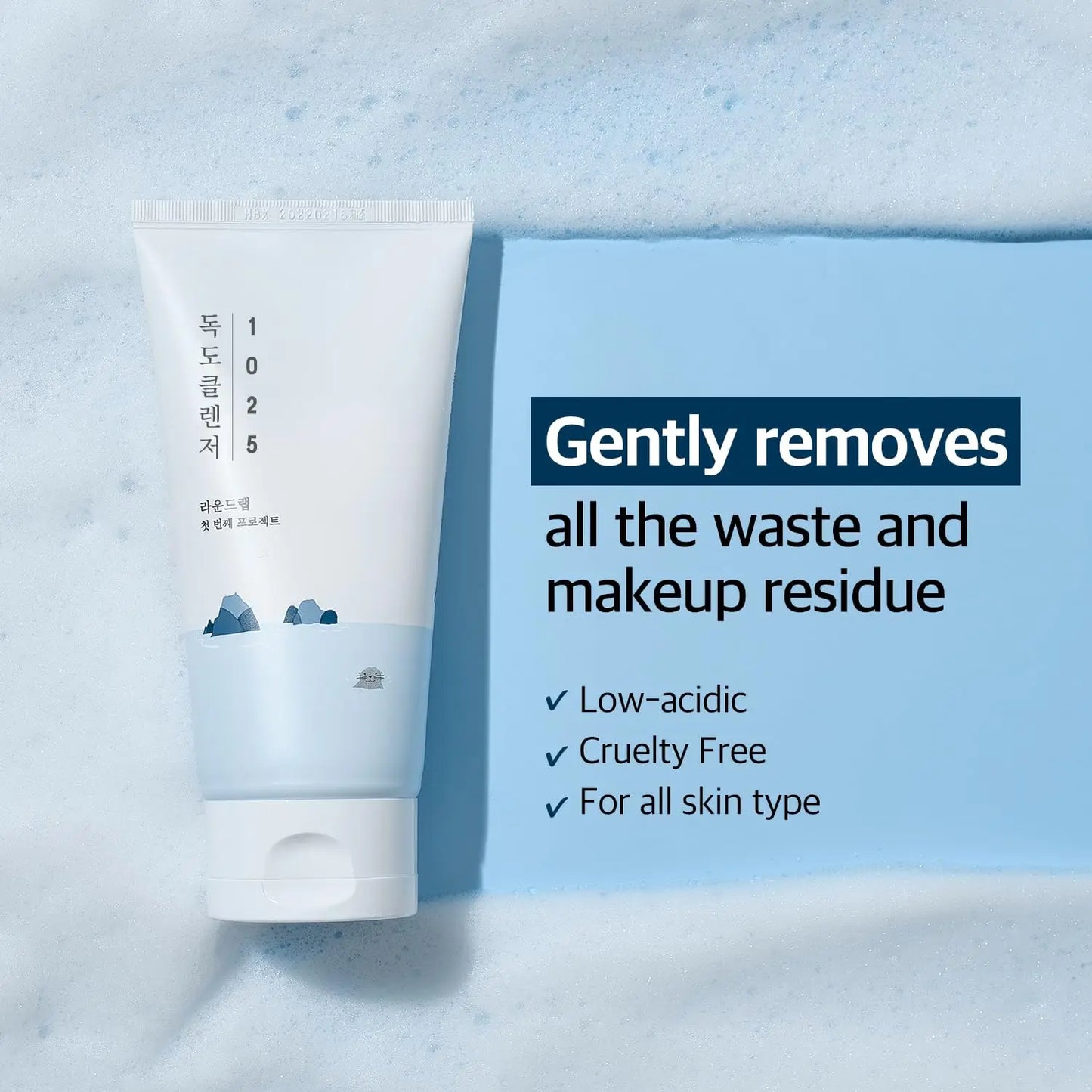 ROUND LAB 1025 Dokdo Cleanser 150ml tube on a blue background, promoting gentle removal of makeup and waste with low-acidic, cruelty-free formula suitable for all skin types.
