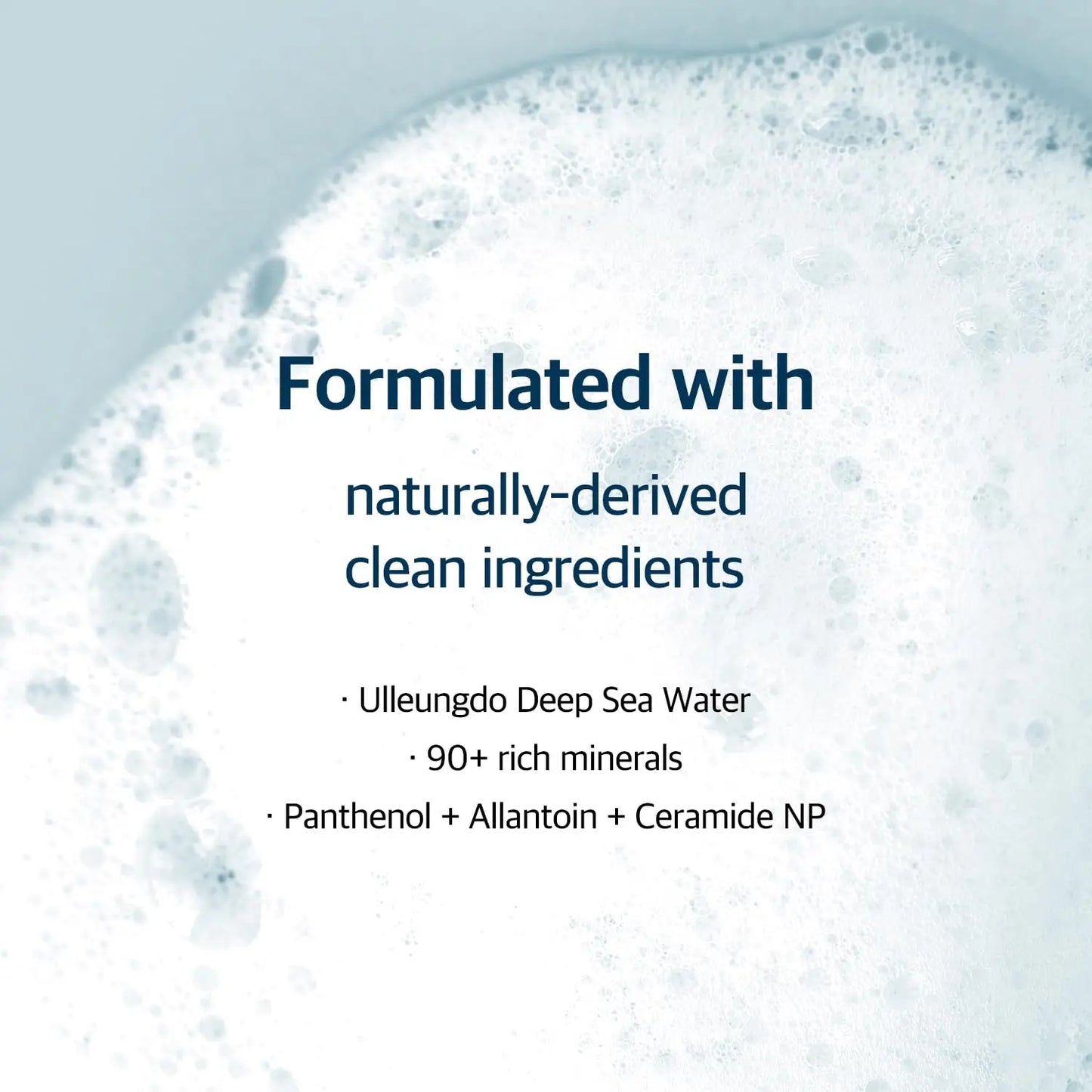 Foamy texture background with text highlighting the natural ingredients including Ulleungdo Deep Sea Water, 90+ rich minerals, Panthenol, Allantoin, and Ceramide NP for ROUND LAB 1025 Dokdo Cleanser 150ml + Dokdo Cream 80ml.