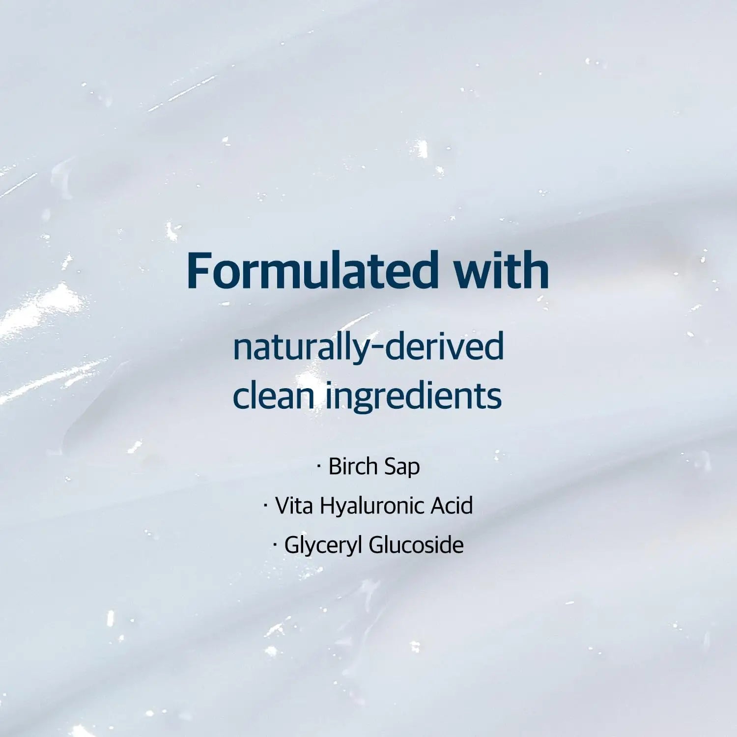 Close-up of white cream texture with text highlighting ROUND LAB Birch Juice Moisturizing Cream 80ml formulated with naturally-derived clean ingredients including birch sap, hyaluronic acid, and glyceryl glucoside.