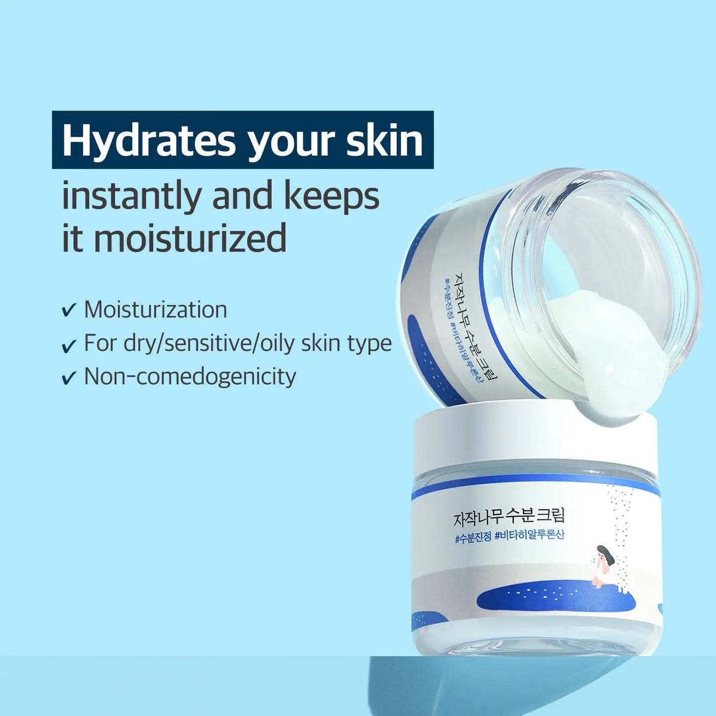 Two open jars of ROUND LAB Birch Juice Moisturizing Cream 80ml with white cream inside, displayed against a light blue background with text highlighting its moisturizing benefits for dry, sensitive, and oily skin types.