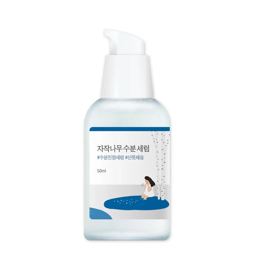 ROUND LAB Birch Juice Moisturizing Serum (50 ml) in a clear pump bottle with blue and white label featuring a minimalist illustration of a woman sitting by a birch tree.