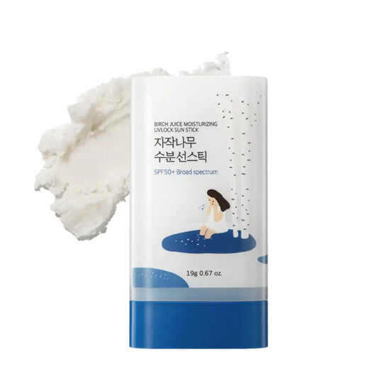 ROUND LAB Birch Juice Moisturizing Sun Stick 19g with SPF50+ broad spectrum protection shown with white creamy texture and packaging featuring a woman sitting by birch trees.