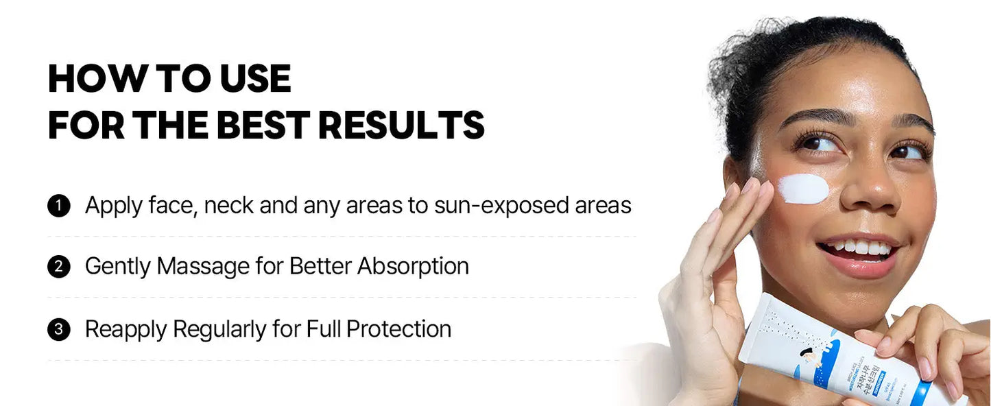 Woman smiling while applying ROUND LAB Birch Juice Moisturizing Sunscreen 50ml to her cheek, demonstrating how to use for best sun protection results.