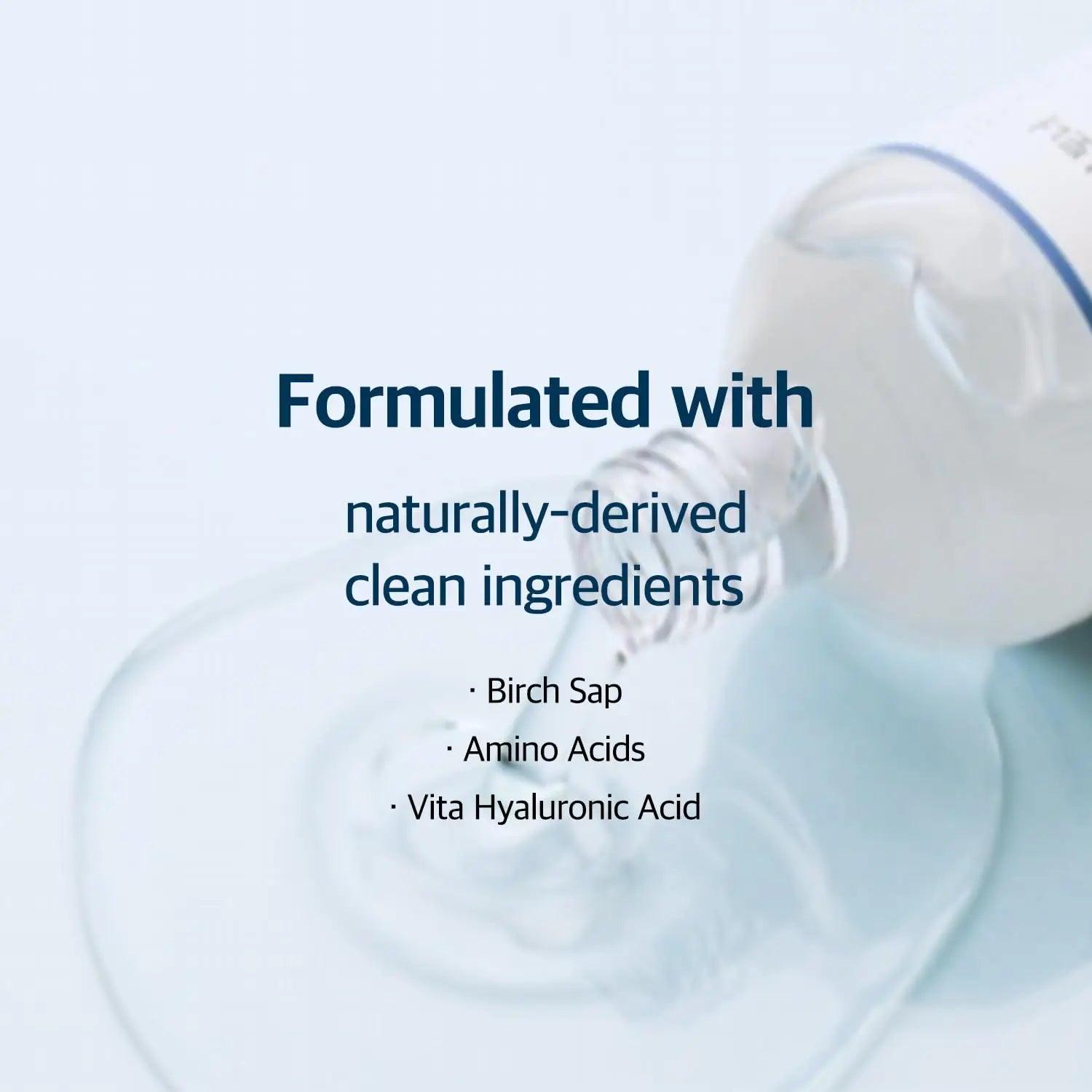 Clear liquid poured from a bottle displaying text that highlights naturally-derived clean ingredients including birch sap, amino acids, and vita hyaluronic acid for ROUND LAB Birch Juice Moisturizing Toner 300ml.