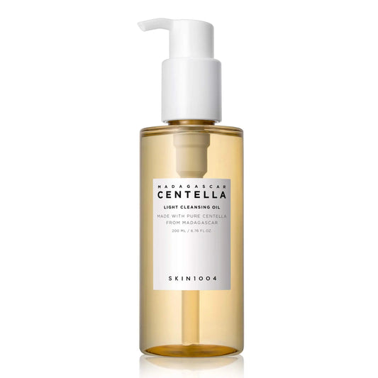 Skin 1004 Madagascar Centella Light Cleansing Oil 200ml in a clear pump bottle with light golden oil, designed for gentle facial cleansing with centella asiatica extract.