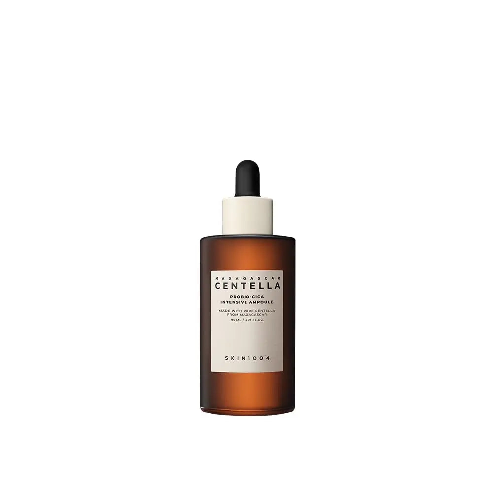 Skin 1004 Madagascar Centella Probio-Cica Intensive Ampoule 95ml in a brown glass dropper bottle designed for soothing and hydrating facial skincare.