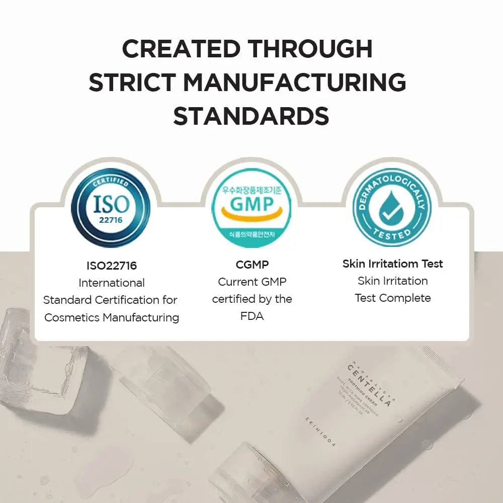 Certification icons showing ISO 22716, CGMP by FDA, and dermatologically tested, emphasizing strict manufacturing standards for Skin 1004 Madagascar Centella Soothing Cream 75ml.
