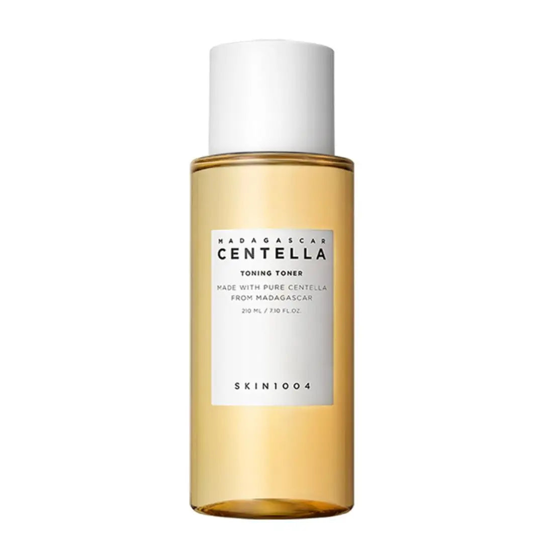 Skin 1004 Madagascar Centella Toning Toner 210 ml in a translucent amber bottle with a white cap and label, designed for soothing and hydrating the skin.
