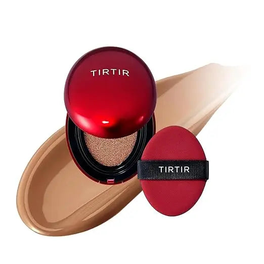 TIRTIR Mask Fit Red Cushion Foundation with red compact and applicator sponge placed on smooth beige foundation swatch for a flawless skin look.